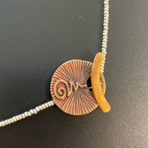 SAK Bronze front toggle pendant on sterling necklace, handmade artist piece